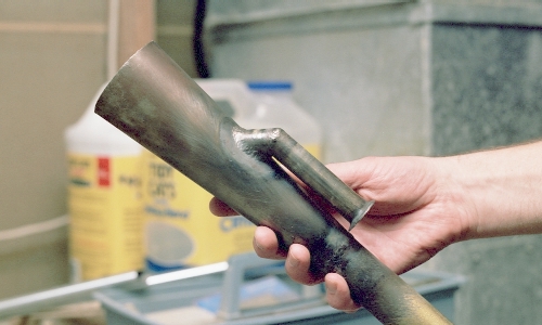 The intake tube, finish welded into the chamber wall - Photo (c) 2004 Larry Cottrill