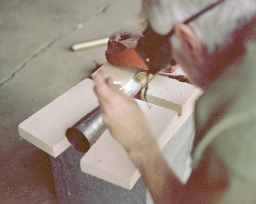 Welding the combustion chamber cone to the tailpipe tube (c) 2004 Larry Cottrill