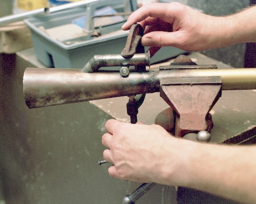 Jigging the intake to the chamber cone with a bolt, nut and C-clamp - Photo (c) 2004 Larry Cottrill