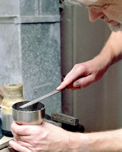 Smoothing the sawed edge with a flat file (c) 2003 Larry Cottrill