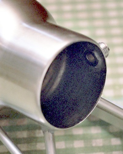 Fuel pipe mount stud in place, as seen from the inside of the intake section of the diffuser shell (c) 2003 Larry Cottrill